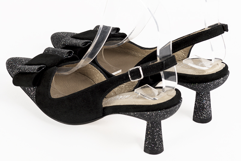 Gloss black women's open back shoes, with a knot. Tapered toe. Medium spool heels. Rear view - Florence KOOIJMAN